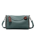 Compact genuine cowhide leather barrel crossbody bag