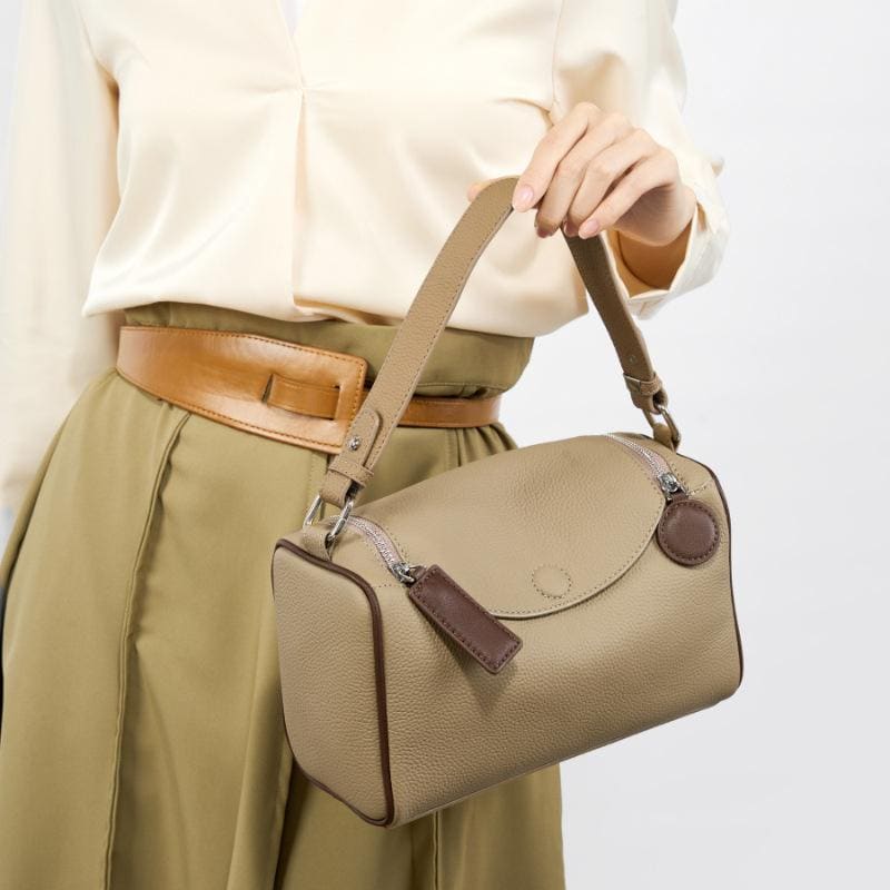 Compact genuine cowhide leather barrel crossbody bag