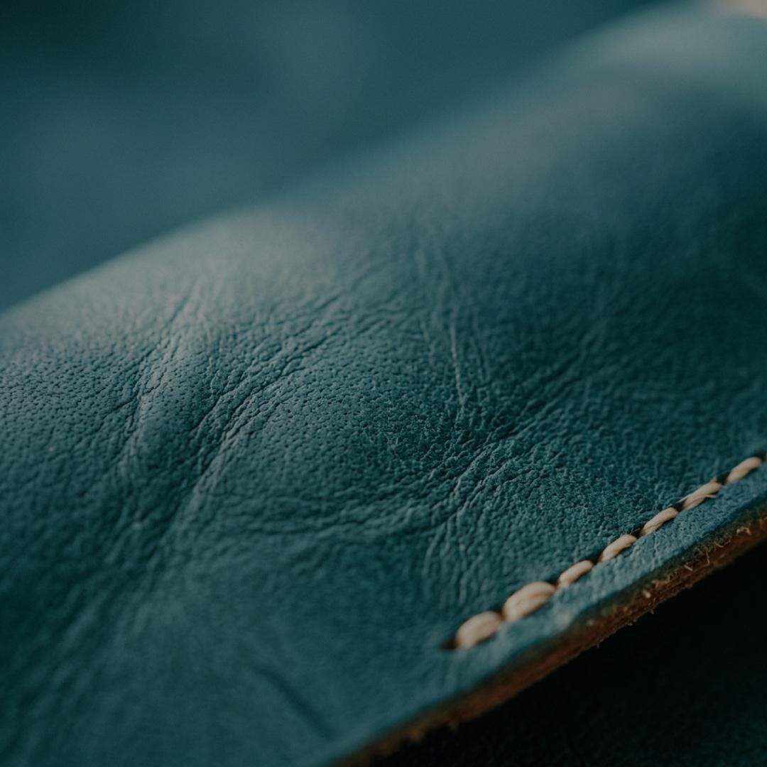 Compact genuine cowhide leather barrel crossbody bag