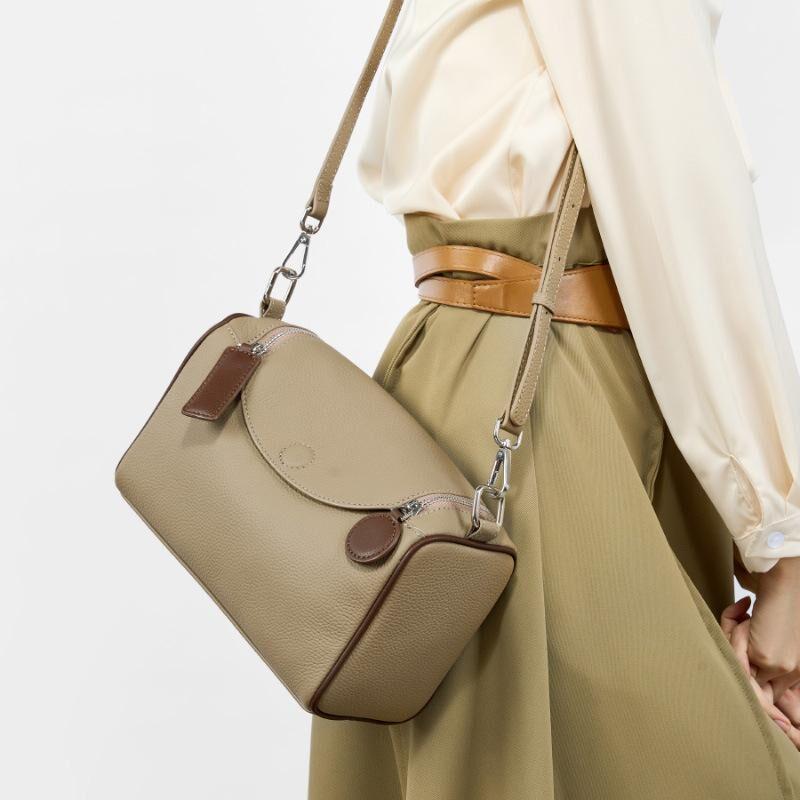 Compact genuine cowhide leather barrel crossbody bag